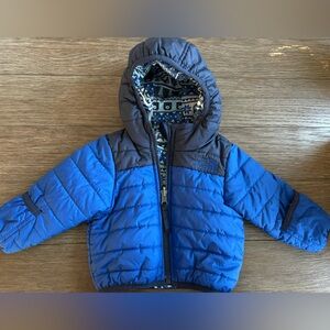The North Face- reversible hooded puffer baby jacket. Like new! Size 3-6 months.
